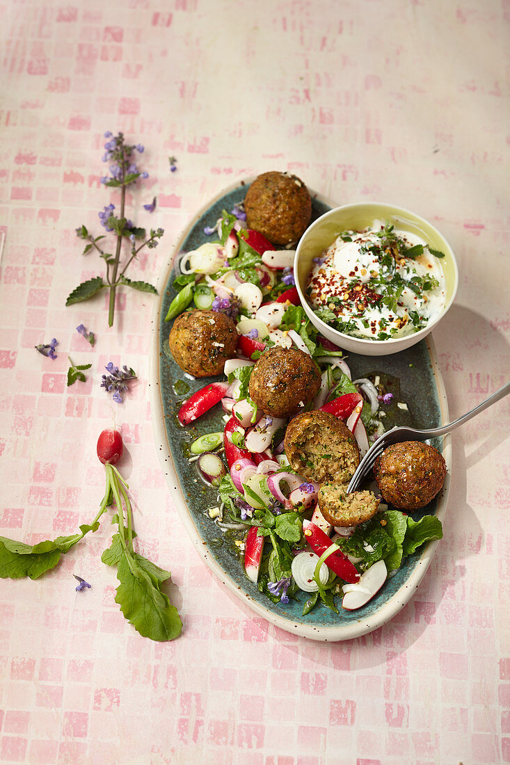 Courgette falafel with herb yoghurt and radish salad