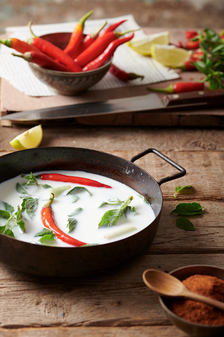 Coconut milk with chillies and Asian herbs