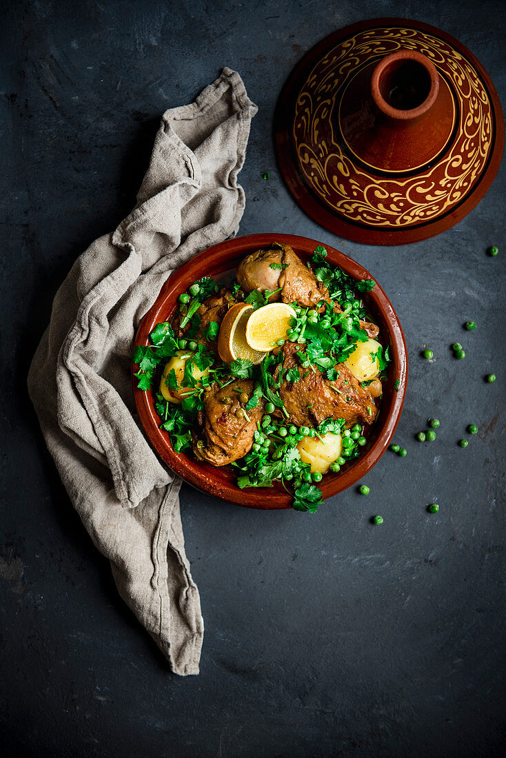 Moroccan chicken tagine with lemons and peas