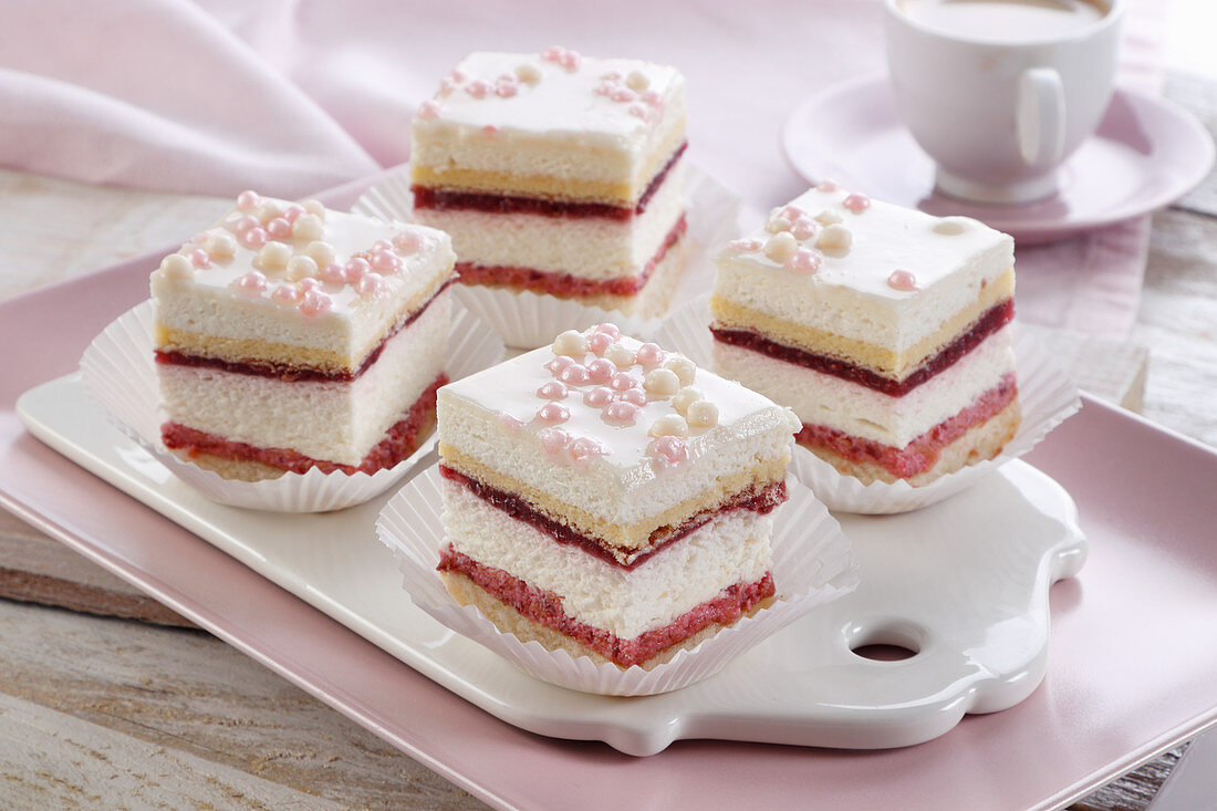 Layer cake with raspberry and cream foam