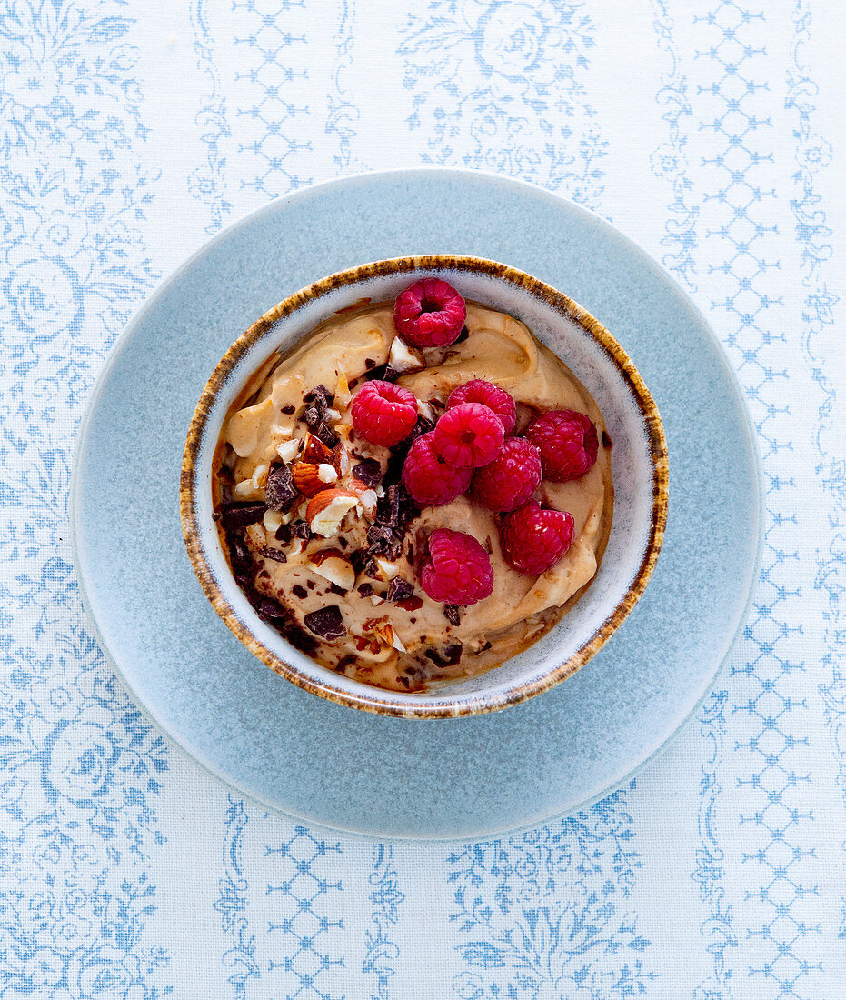 Chocolate mousse with raspberries and nuts
