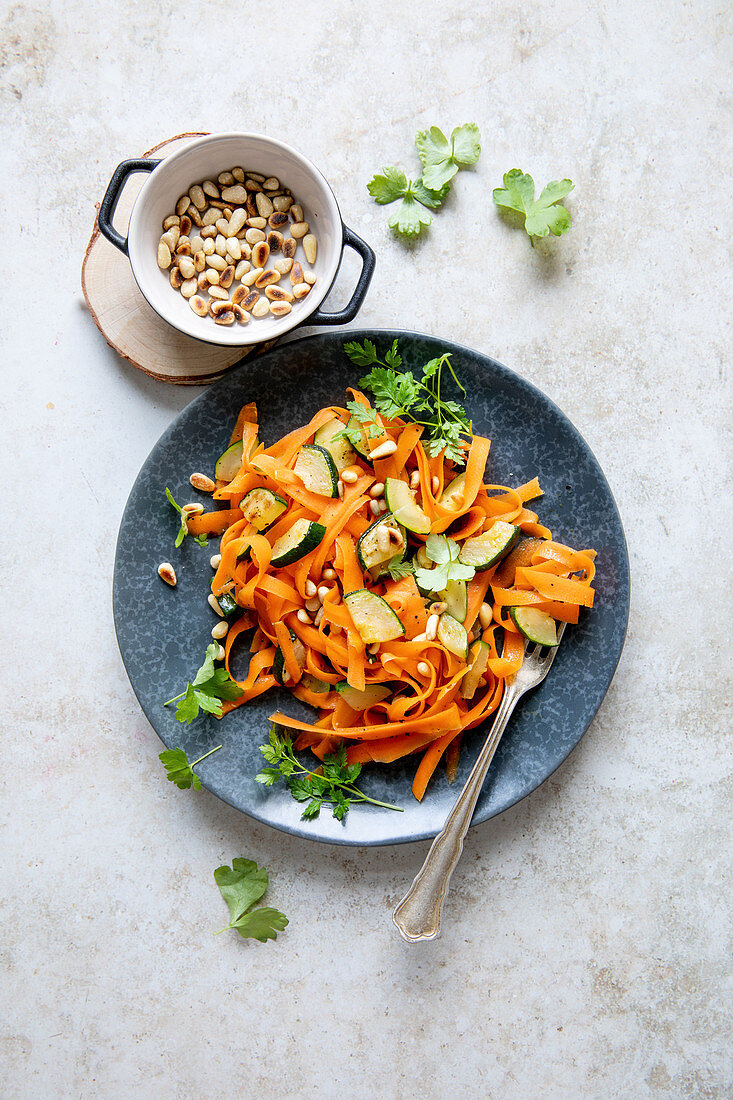 Carrot tagliatelle with roasted pine nuts