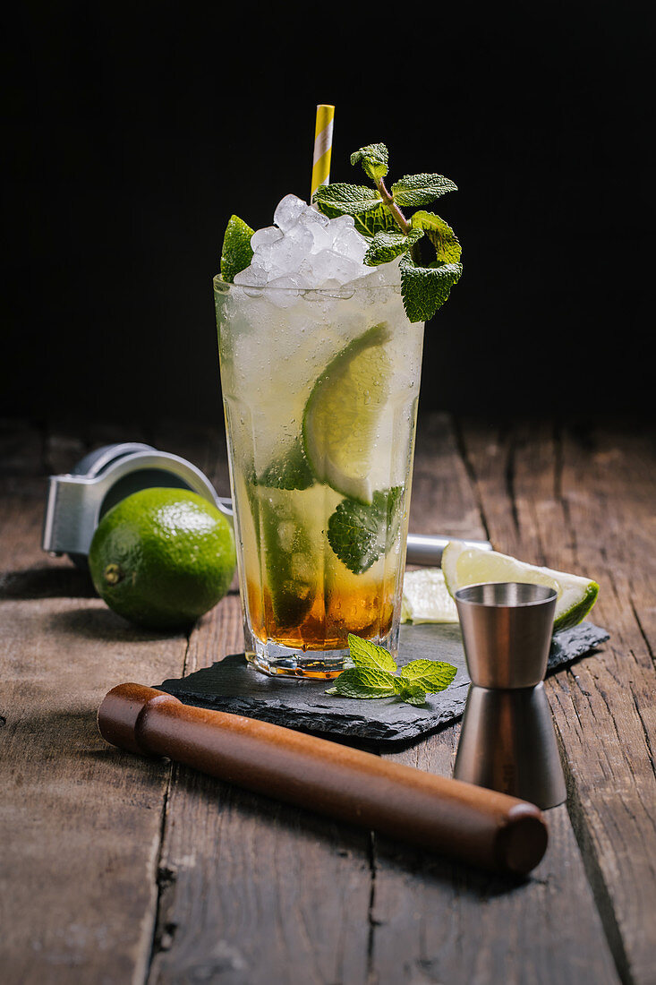 Mojito cocktail with ice and mint leaves