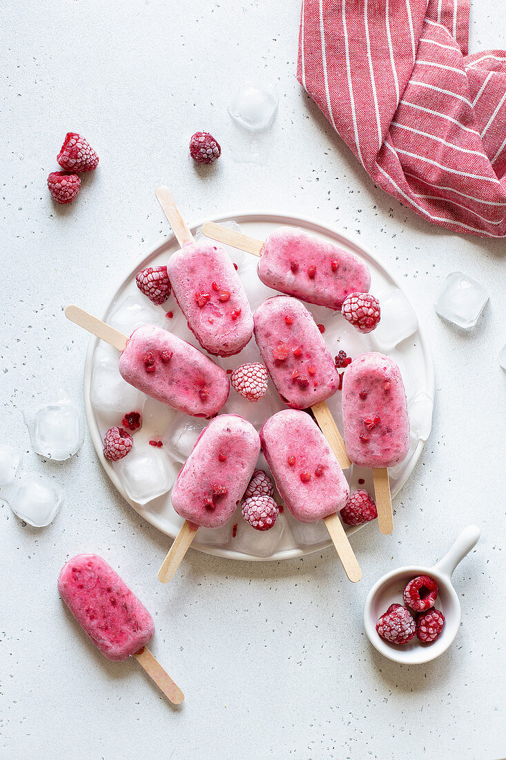 Raspberry ice cream on sticks