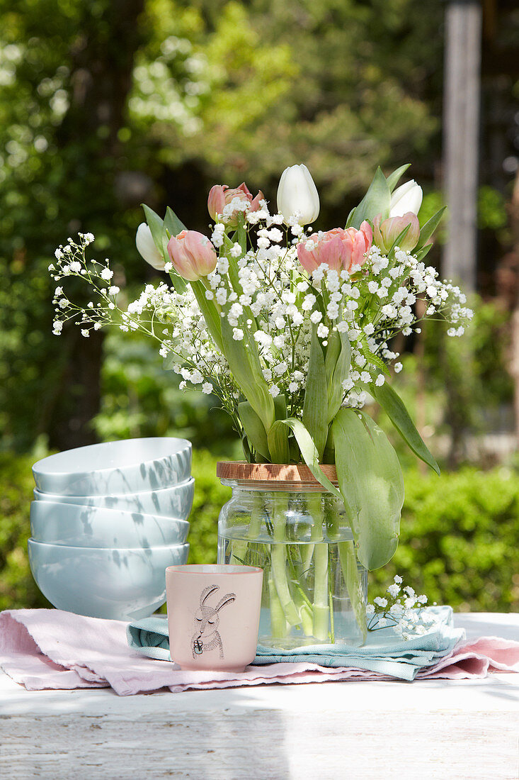 Easter bouquet of tulips and gypsophila (baby's breath)