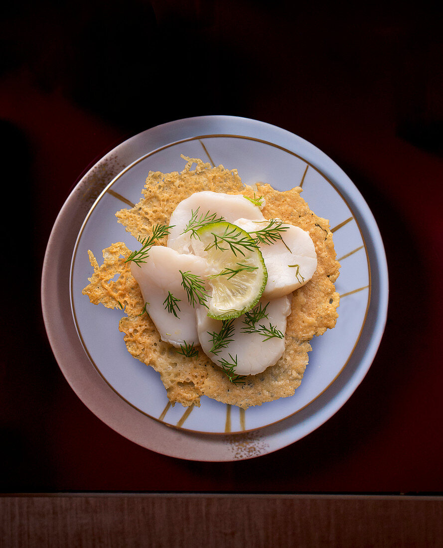 Scallops on parmesan chips