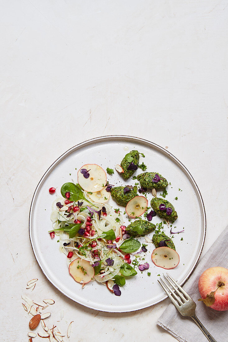 Almond-parsley gnocchi with apple-fennel salad