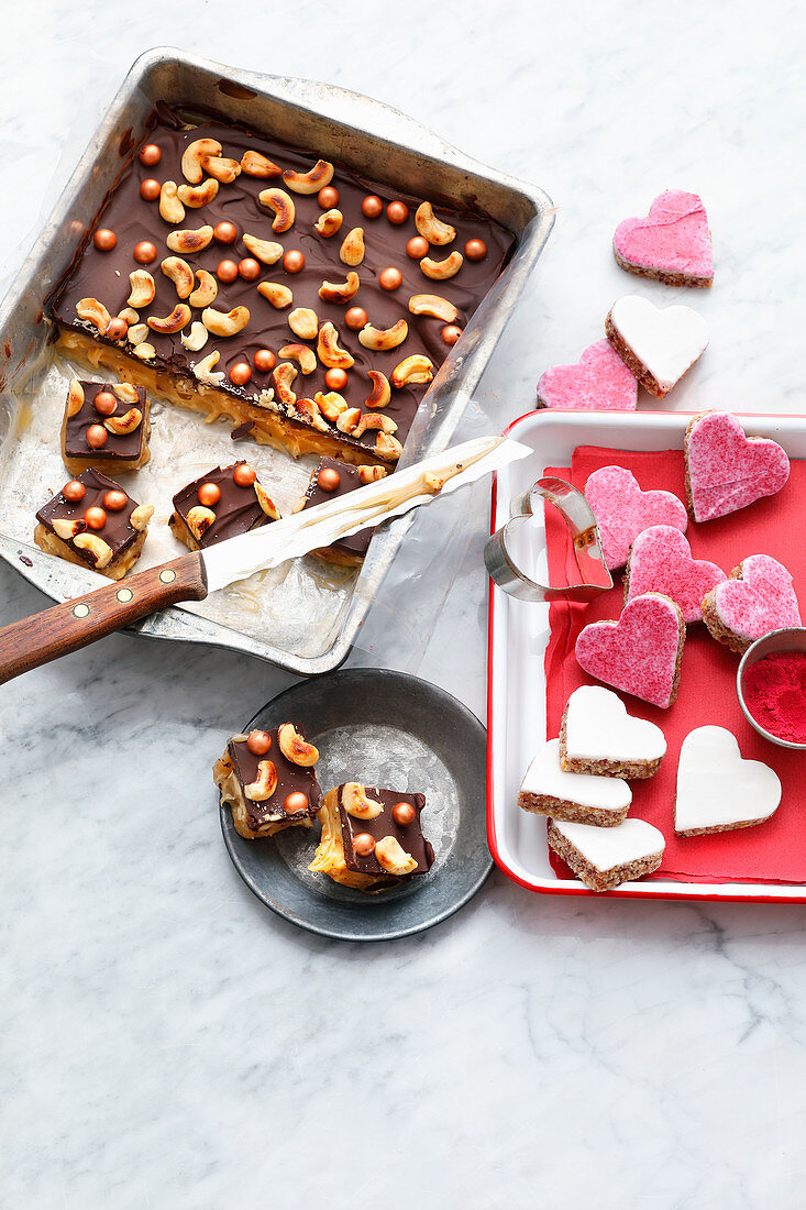 Cashew caramel confectionery and almond hearts with cassis icing