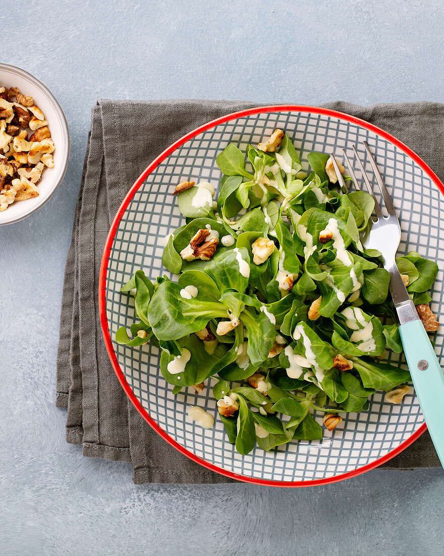 Lamb's lettuce with walnuts and a mustard dressing