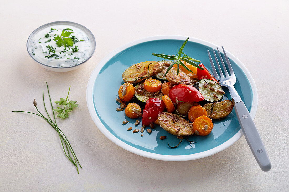 Oven-roasted vegetables with a herb and quark dip