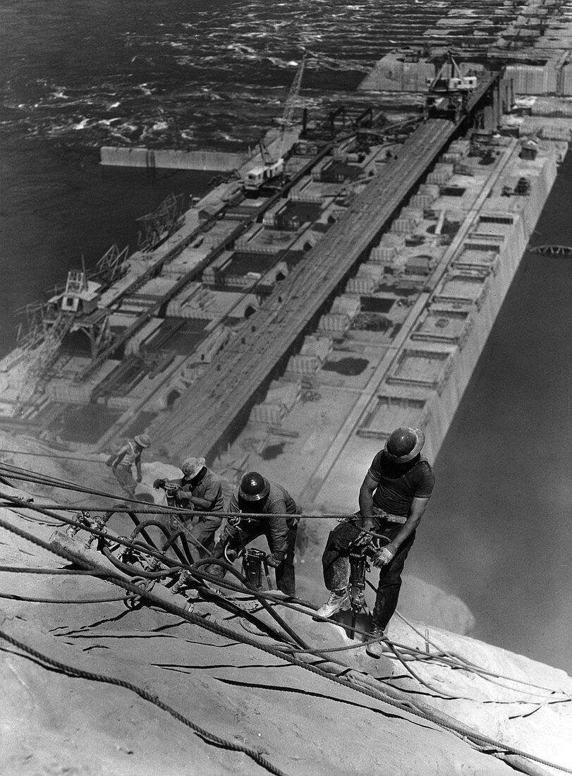 Workers drilling during construction of the Coulee Dam, USA
