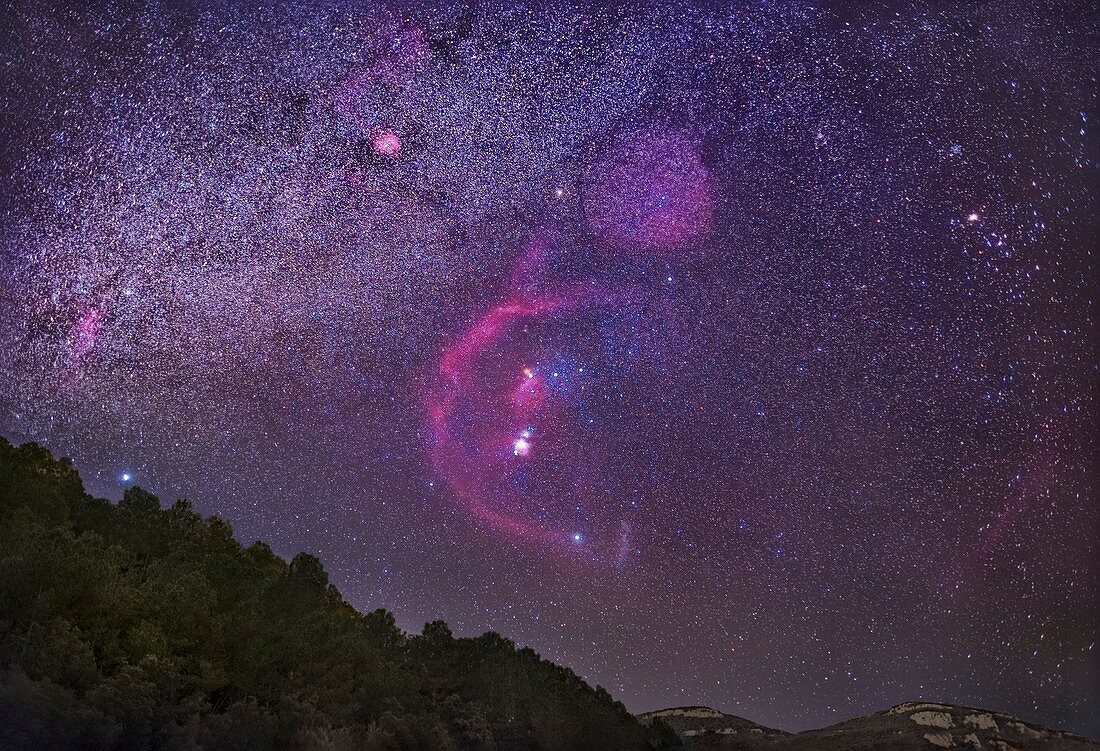 Orion constellation over mountains