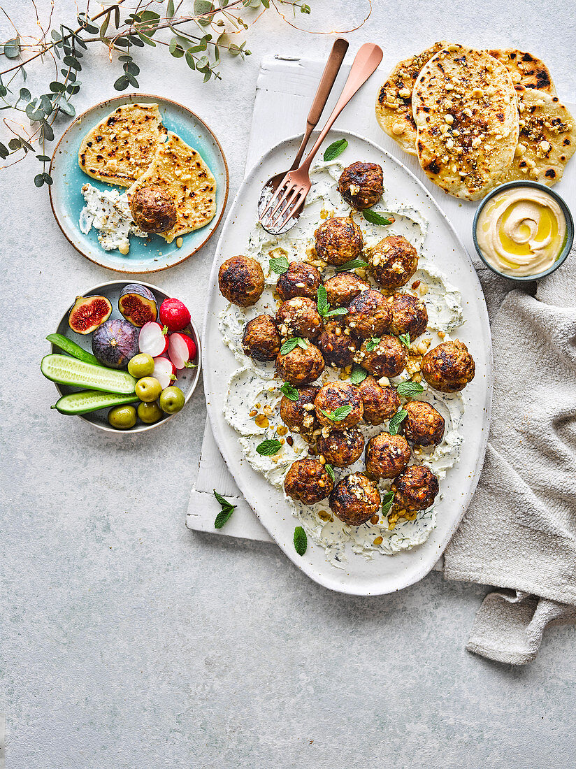 Lamb, date and pine nut meatballs with labney and dukkah flatbreads