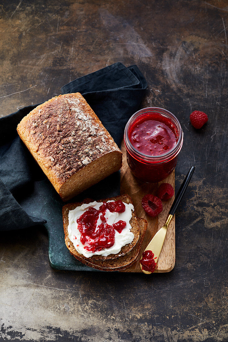 Wholemeal bread with quark and raspberry jam