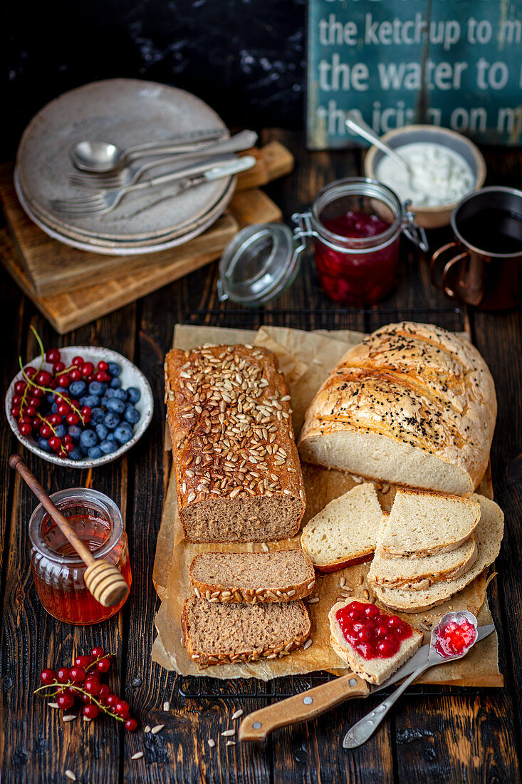 Homemade breads with jam and honey
