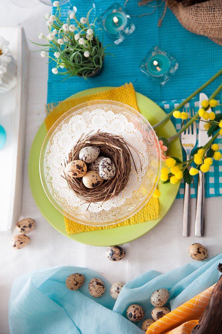 Easter table setting with quail eggs