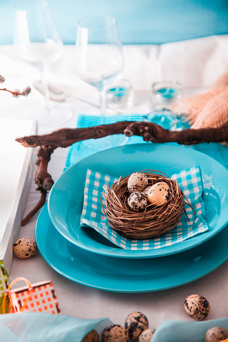 Easter table setting with quail eggs