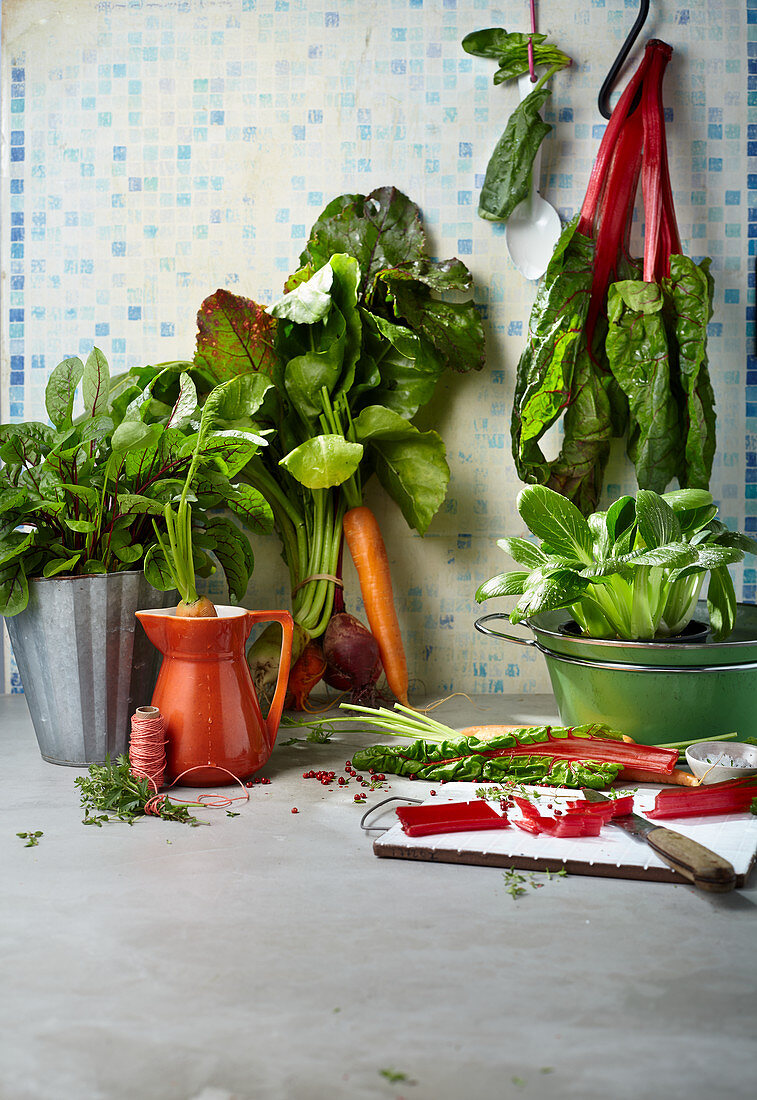 Fresh leafy vegetables and herbs from a garden