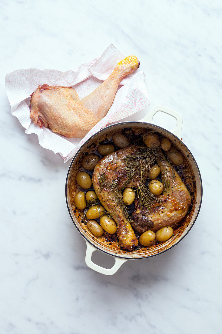 Roasted chicken legs with olives and rosemary