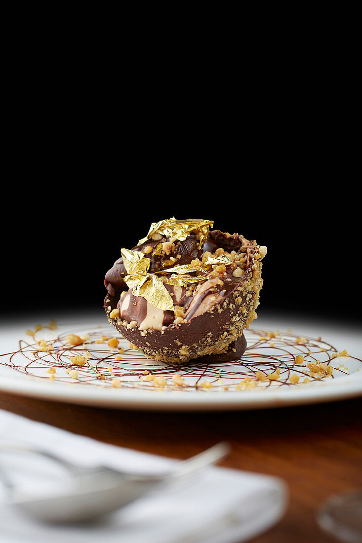 Ambassador’s Reception: a spherical chocolate dessert with nuts