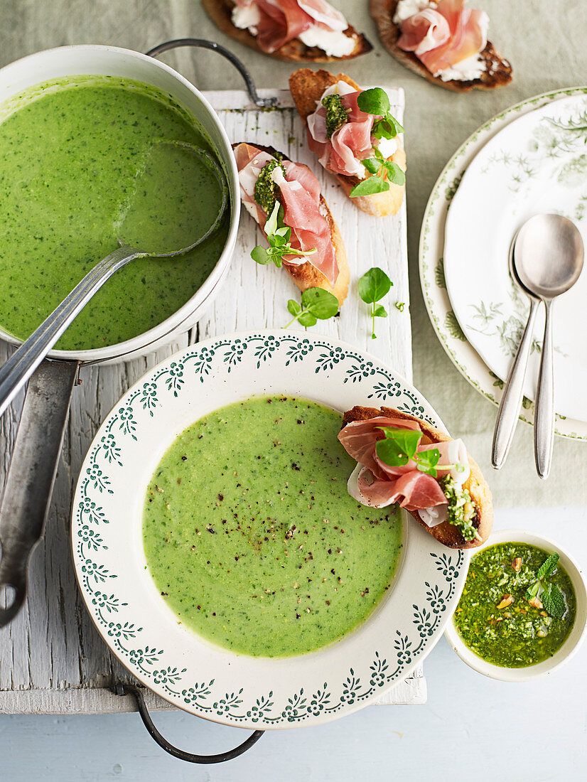 Creamy spring soup with goat's cheese and prosciutto toasts