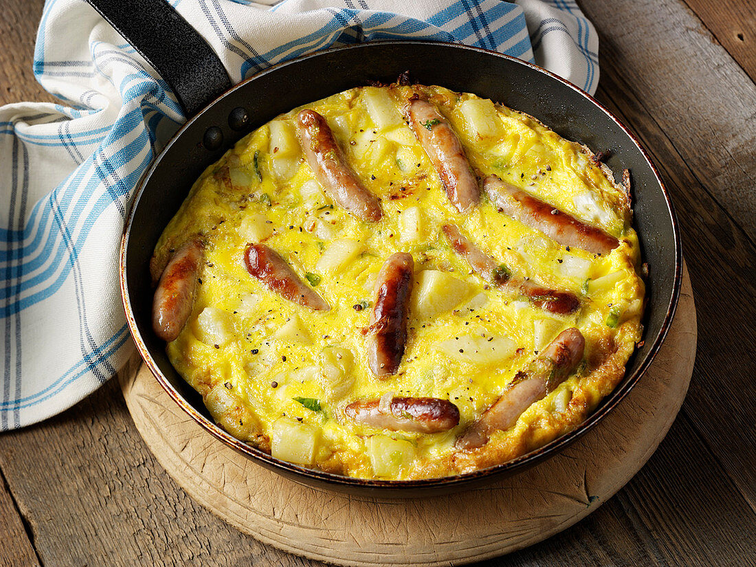 Vegetable tortilla with sausages