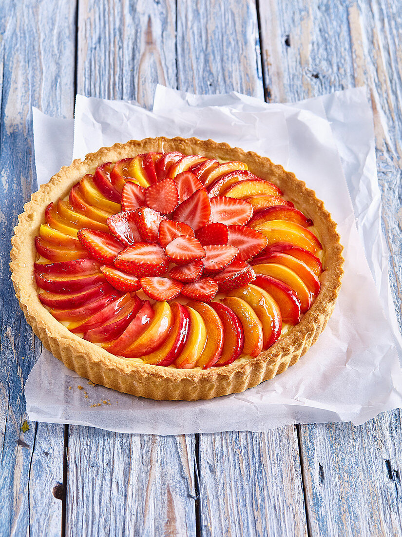 Peach cake with strawberries