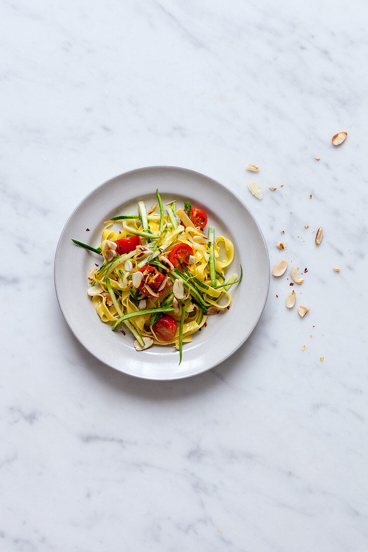 Tagliatelle with zucchini and peanuts