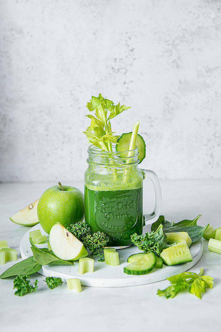 Vegetable and apple juice with celery, kale, cucumber, spinach, apple