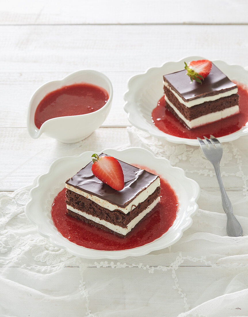 Creamy slices with strawberry sauce