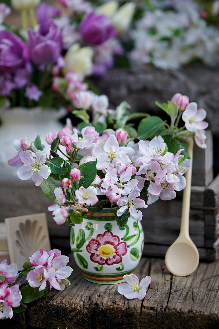 Small bouquet made of apple blossom branches