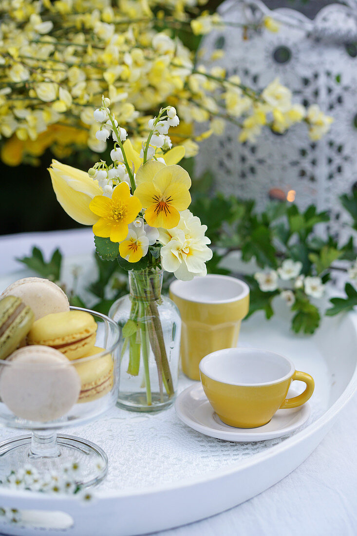 Posy of violas, buttercups, lily-of-the-valley, tulip and primulas