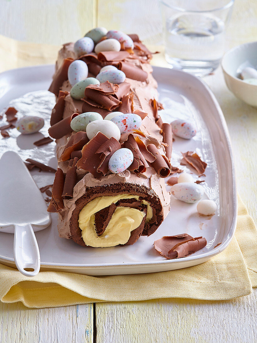 Chocolate Swiss roll with eggnog cream for Easter