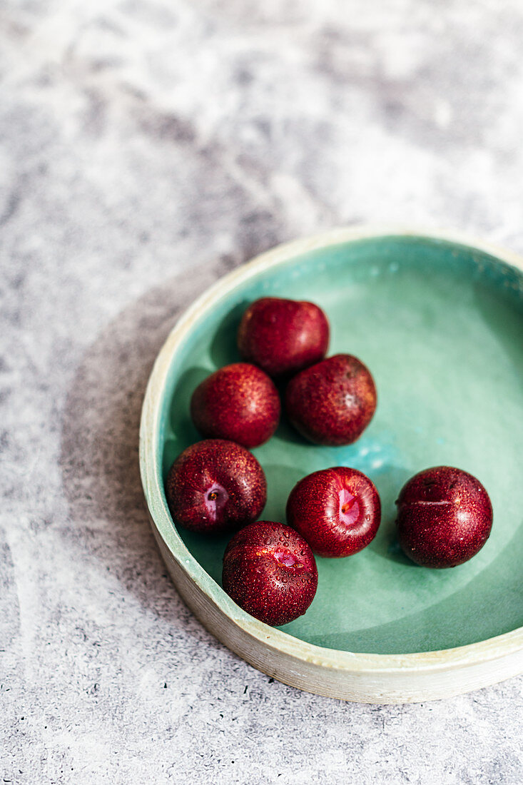 Plums in bowl