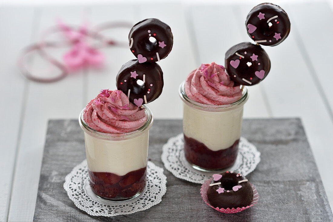 Vegan cherry and vanilla dessert with chocolate donuts on skewers