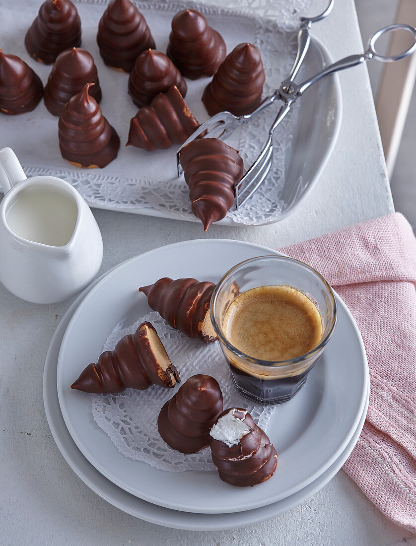 Chocolate coated mousse towers