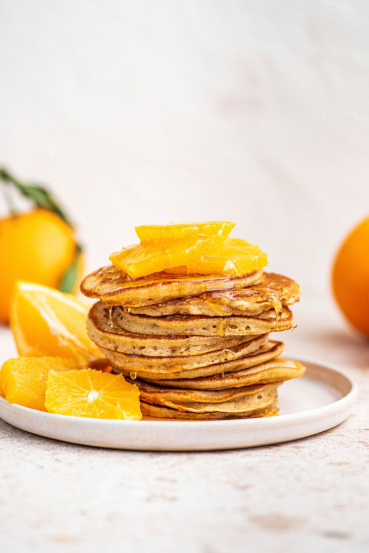 Sourdough Pancakes with sliced orange