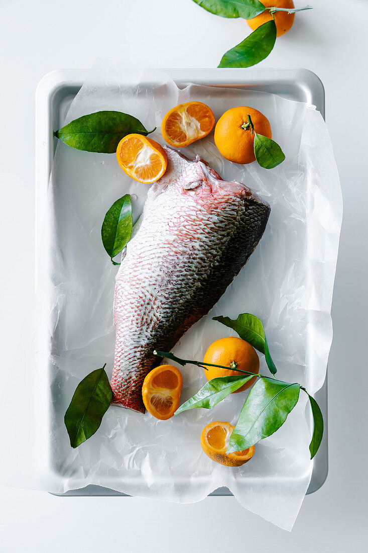 Oven ready fish red snapper with tangerines
