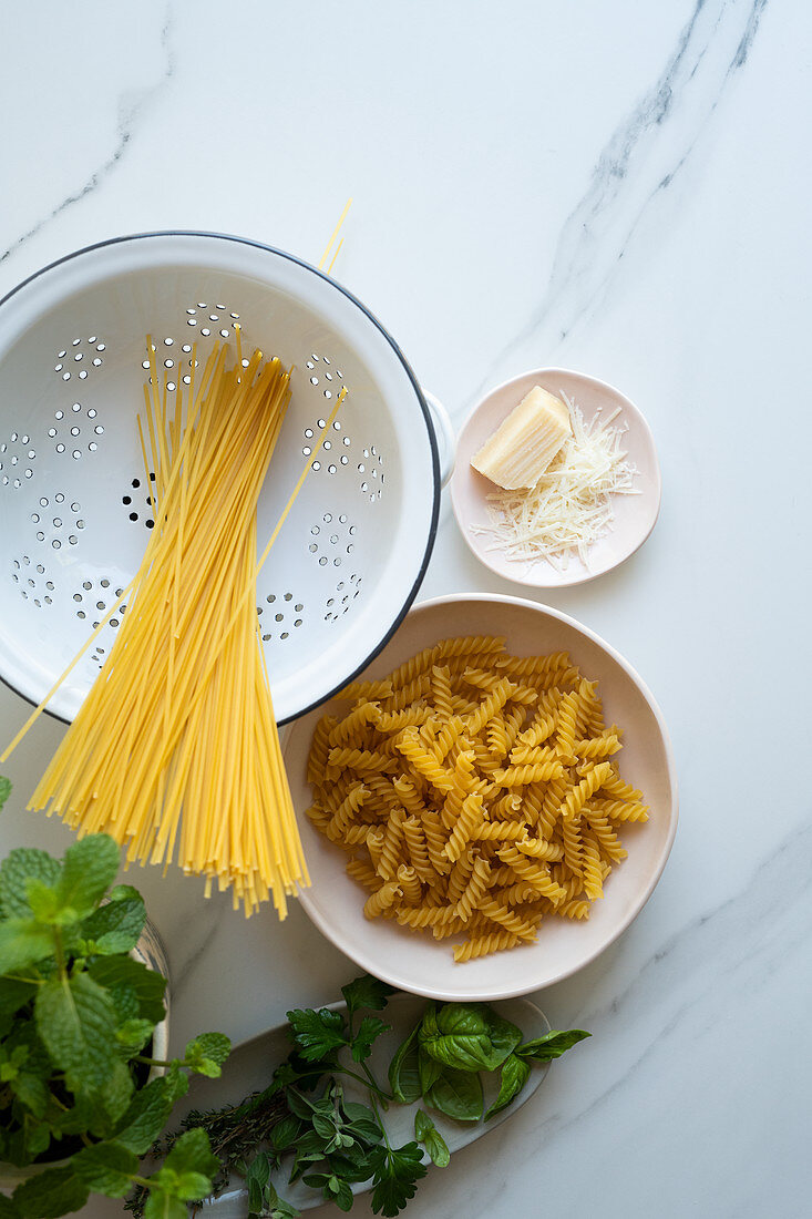 Spaghetti, fussili, parmesan and herbs