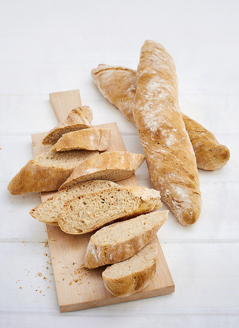 Baguette, whole and sliced
