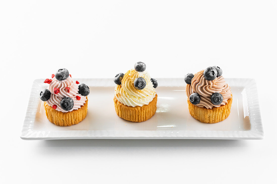 Cupcake with buttercream and blueberries