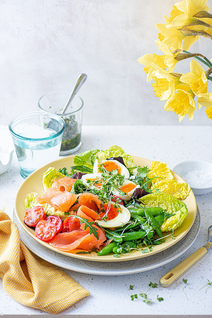 Spring salad with soft boiled eggs, beans, smoked salmon and cress