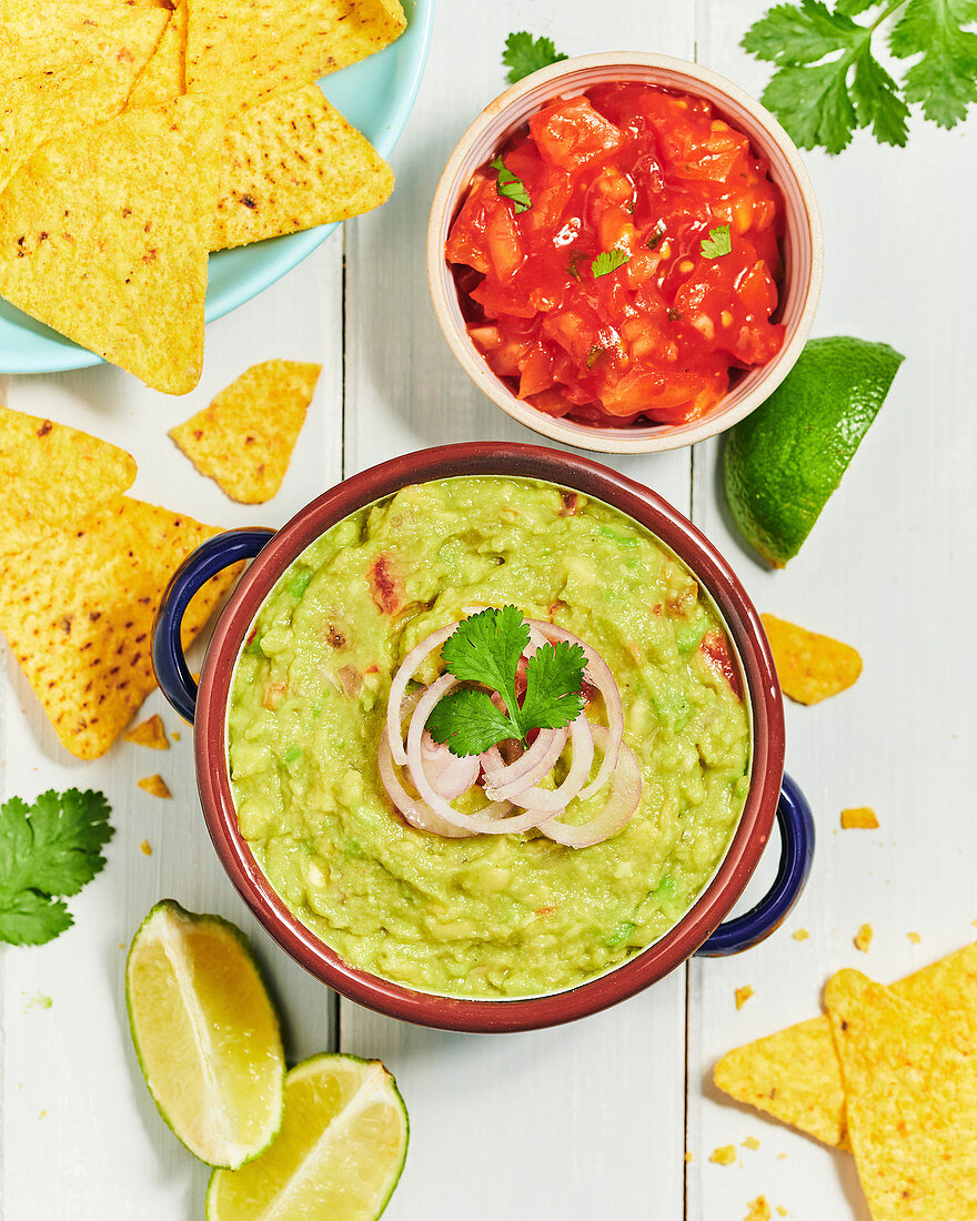 Mexican guacamole with salsa and corn chips