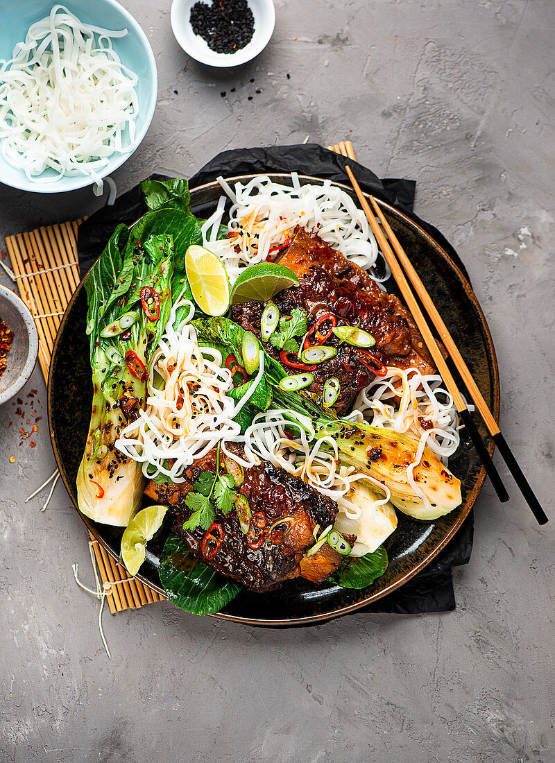 Korean-style beef ribs with bok choy and rice noodles