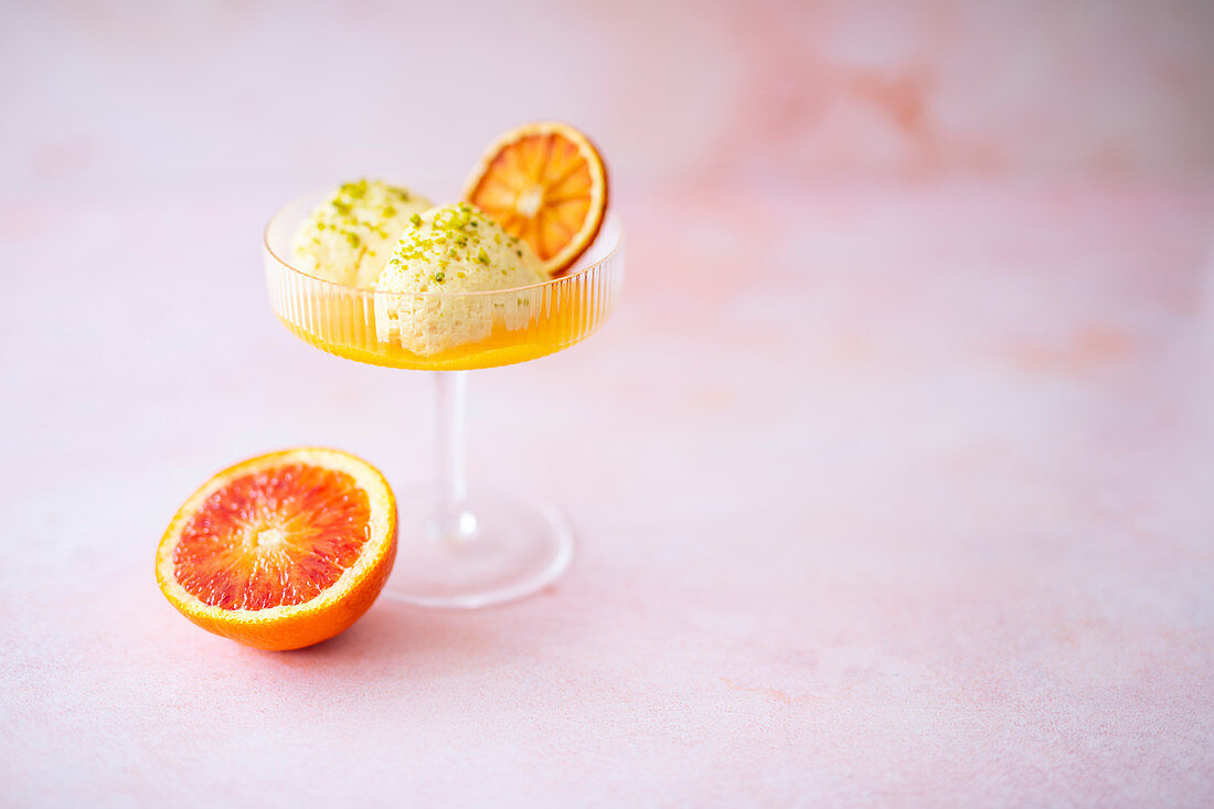 Blood orange mousse with oriental spices and pistachios