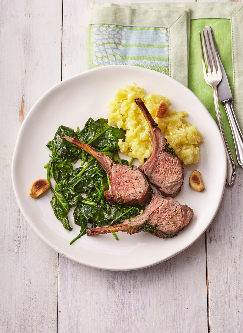 Lamb chops with wild garlic, spinach and potato mash