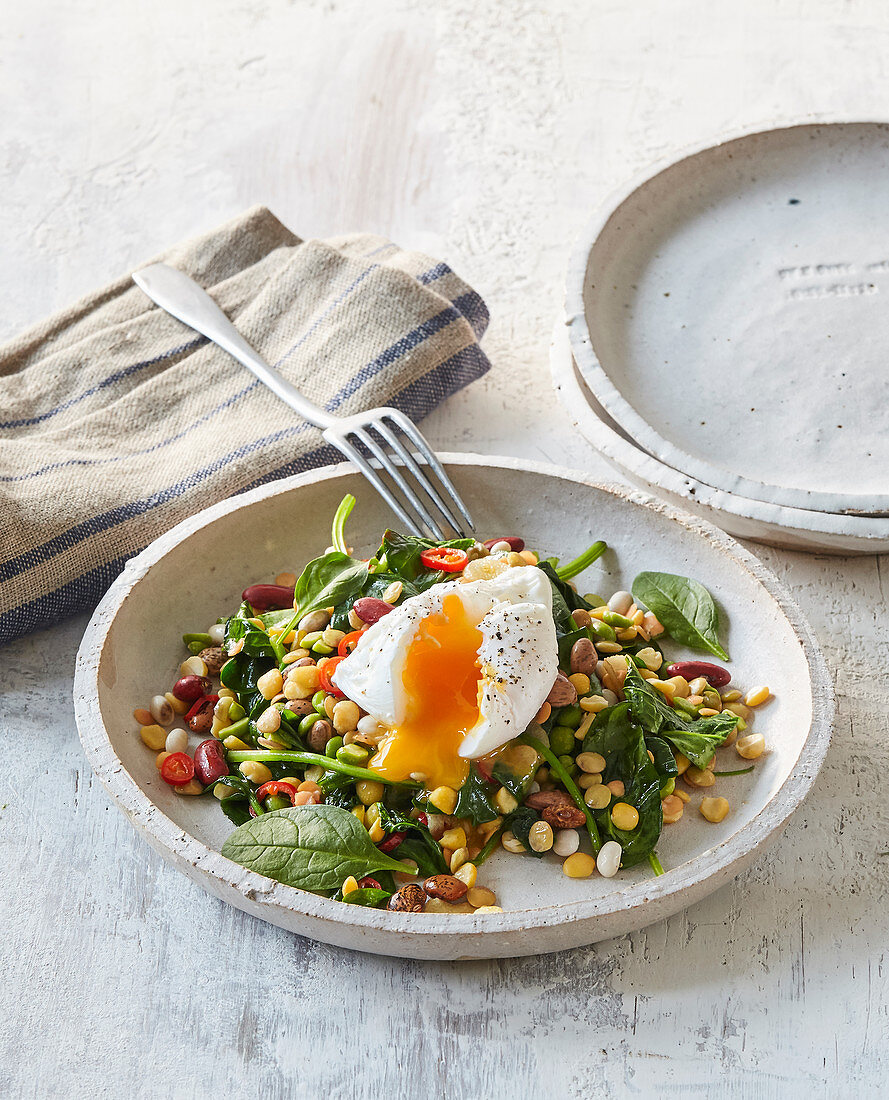 Legume salad with poached egg