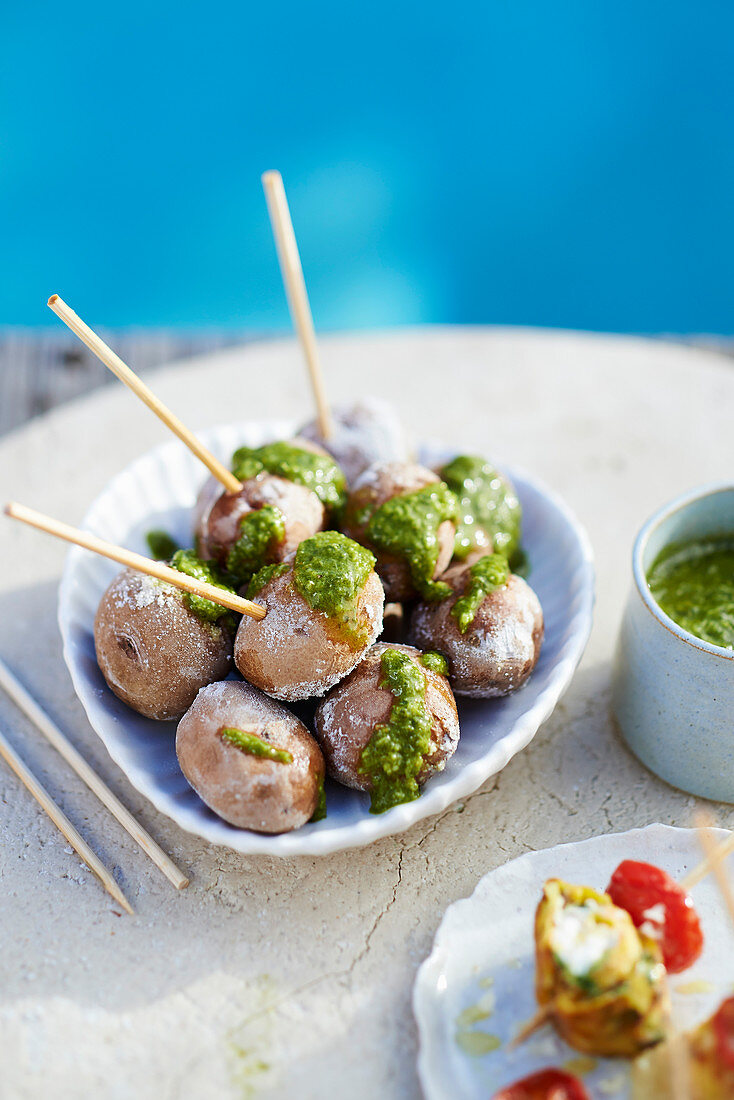 Baby potatoes in sea salt with herb salsa