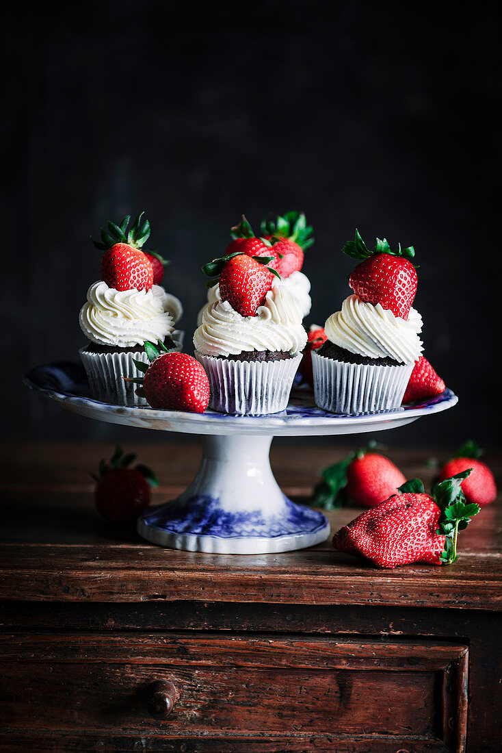 Chocolate cupcake with mascarpone frosting and strawberry