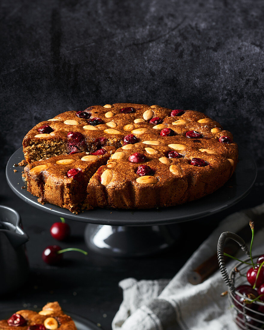 Almond and cherry cake with brandy and honey syrup